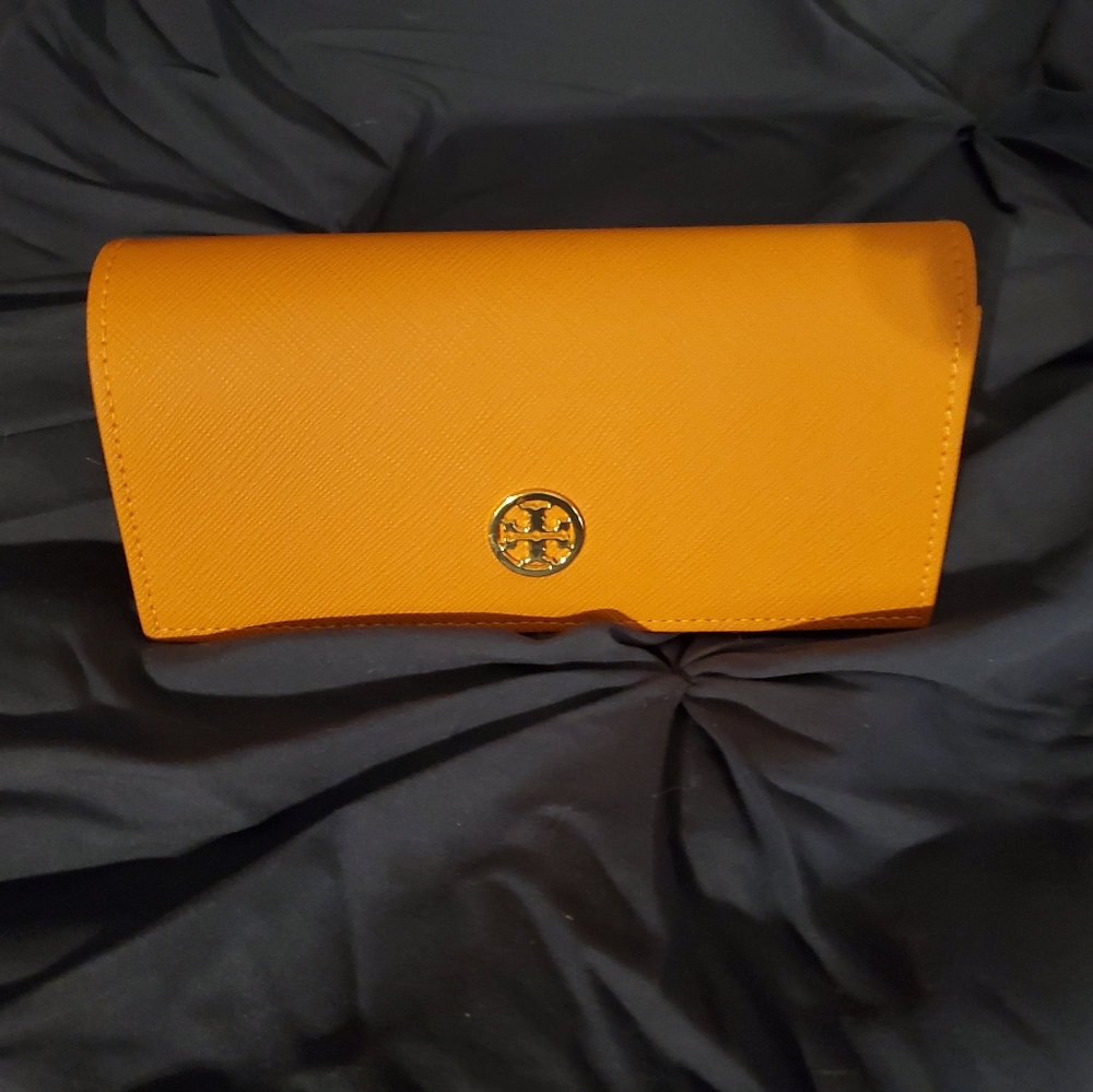 Tory Burch Hard-shell Sunglasses case made from Orange Saffiano Leather.